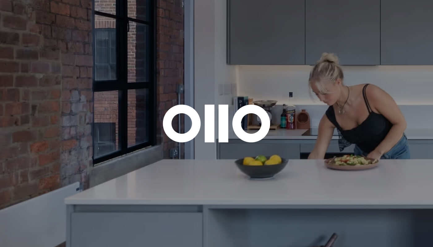 Ollo logo infront of photo of woman at home